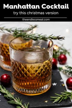 two glasses filled with christmas cocktail on top of a table