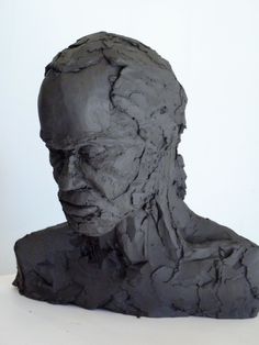 a sculpture of a man's head is shown