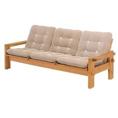 a wooden couch with four cushions on it