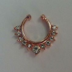 This Is A Brand New Rose Gold Fake Septum Ring With Clear Crystals, Rg36 This Is A Boutique Item. Bundle Any Three $7 Or $8 Items And Offer Me $16 And I Will Accept! #Boho #Festival #Fest #Festivalbracelet #Festivaljewelry #Concertjewelry #Concert #Concertbracelet #Silverbracelet #Summer #Summerjewelry #Coachella Rose Gold Metal Rings For Wedding, Rose Gold Copper Jewelry For Anniversary, Anniversary Rose Gold Copper Jewelry, Elegant Rose Gold Copper Rings, Fake Septum Ring, Festival Bracelets, Fake Nose Ring, Peacock Ring, Belly Button Piercing Jewelry