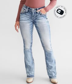 Rock Revival Magan Easy Boot Stretch Jean - Blue 26/30, Women's Magane200 Mid-rise Curvy fit eased through the hip and thigh 17 1/2 bottom opening Rhinestones and sequins on star embroidered back pockets Destruction details. This quality denim is hand-finished for a unique look. It will wear like your favorite jeans, with each hole and tear continuing to destruct over time. You will love the comfort of this denim that has the look and feel of years of wear. . 99% Cotton 1% Elastane. Machine wash Rock Revival Jeans Women, Jean Fits, Say No More, Womens Jeans Bootcut, Xmas Wishlist, Jeans Bootcut, Womens Jeans, Rock Revival, Teenage Fashion Outfits