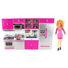 a barbie doll standing in front of a pink and white kitchen