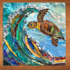 a sea turtle is swimming in the ocean with waves and bubbles on it's side