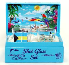 shot glass set in blue box with beach scene