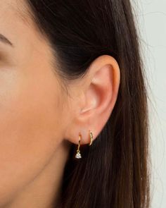 "Delicate huggie hoop earrings with a tiny prong-set white cubic zirconia drop charm. Understated and elegant, these dainty hoops will mix and match effortlessly with other earrings and are perfect for everyday wear. * D E T A I L S * ∙ Sold individually (1 earring) or by pair (2 earrings) ∙ Material: .925 Sterling Silver or 18K Gold Plated over .925 Sterling Silver ∙ Stone: White Zirconia ∙ Dimensions: Hoop diameter: 11mm // Zirconia: 3mm ∙ Hypoallergenic & nickel-free * P A C K A G I N G * Hoop Earrings Big, Earrings Small Hoop, Double Earrings, Small Gold Hoop Earrings, Earrings Gold Hoop, Dainty Hoop Earrings, Small Gold Hoops, Tiny Hoop Earrings, Hoops Gold