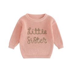 This knitted sweater will keep the love of the family warm and stylish! Perfect for chilly days, the soft knitted fabric will keep LITTLE SISTER warm. With its charming design, it's sure to be her favorite! Playful Knitted Winter Sweater, Cute Warm Knit Sweater, Playful Long Sleeve Knitted Sweater, Playful Knitted Long Sleeve Tops, Pink Knitted Long Sleeve Top, Pink Long Sleeve Knitted Top, Cute Warm Cotton Sweater, Playful Long Sleeve Soft Knit Sweater, Cute Knitted Sweater For Winter