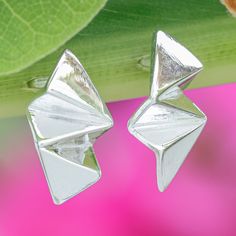 Geometry and elegance unite in Lalana's newest creation. The Thai artisan transforms avant-garde trends into a dazzling pair of stud earrings made from high-polished sterling silver, perfect for a luminous fashion statement. Sterling Silver Stud Earrings, Silver Stud Earrings, Sterling Silver Studs, Sterling Silver Earrings Studs, Silver Earrings Studs, Silver Studs, Jewelry Earrings Studs, Fashion Statement, Geometry