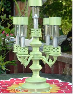 a green candelabra sitting on top of a table