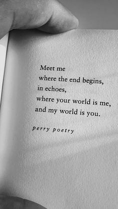 someone is holding an open book with the words meet me where the end begins in ecchoes, where your world is me, and my world is you