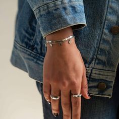 Delicate and versatile, our Serena Dangle Bracelet features a medium-weight chain decorated with dainty geometric circles. This delicate layering bracelet adds elegance to your everyday look and works perfectly in a layered set or worn alone. Sterling Silver Length: 6-7.5in (15-19cm) Lobster clasp Handcrafted in NYC Hypoallergenic, lead and nickel free #B214 Minimal Bracelet, Dangle Bracelet, Geometric Circle, Layered Bracelets, Fashion Accessories Jewelry, Silver Bracelets, Sterling Silver Bracelets, Medium Weight, Everyday Look