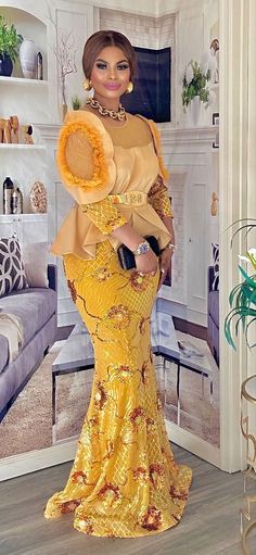 Gold Embellished Long Sleeve Maxi Dress, Glamorous Yellow Floor-length Evening Dress, Fitted Embellished Gold Maxi Dress, Gold Embellished Maxi Length Evening Dress, Gold Embellished Maxi Evening Dress, Festive Yellow Floor-length Maxi Dress, Gold Maxi Dress For Banquet, Elegant Yellow Embellished Evening Dress, Festive Yellow Maxi Dress For Party