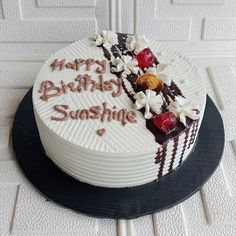 a birthday cake with the words happy birthday sunshine written on it