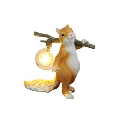 a squirrel lamp with a light bulb on it's back and its tail hanging down