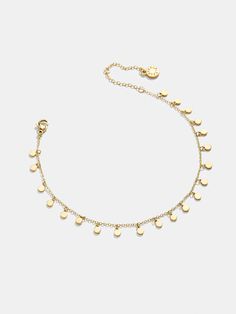 We took one of our best-selling necklaces and turned it into an anklet just in time for the warmer weather. Upgrade your go-to chain style. The Clio Anklet features a dainty gold chain and your choice of gold or crystal adornments. It's the perfect addition to any look. Gold Plated Dangle Chain Bracelet, Gold Dangle Chain Bracelet With Adjustable Chain, Gold Plated Dangle Chain Bracelet With Adjustable Chain, Gold Chain Bracelet With Adjustable Chain, Elegant Gold Chain Bracelet With Dangling Charms, Adjustable Chain Dangle Bracelet, Gold-plated Adjustable Anklets, Gold Plated Adjustable Chain Anklets, Gold Plated Anklet With Adjustable Chain