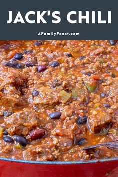 a red pot filled with chili and beans