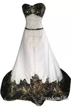 a white and black wedding dress on display