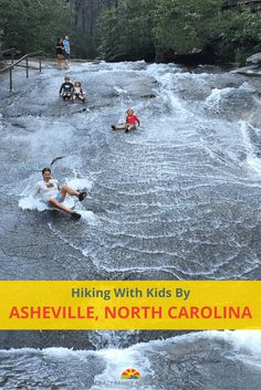 people riding water skis on top of a river