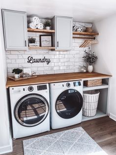 Modern laundry room nook featuring a tiled wall with cabinets, floating shelves and a wooden countertop Interior Design Per La Casa, Laundry Decor