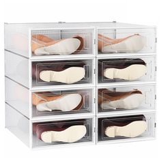 four clear drawers with six pairs of shoes in them