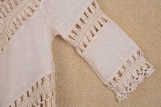 "Fringe Crochet womens top ,crochet fringe beach top, Summer Fashion Women's tops,Womens Blouse **.♥.**'.♥.**'.♥.**'.♥.**'.♥.**'.♥.** This crochet beach top made from soft pure cotton. It functions as a fun summer top paired with shorts or jeans and as a bikini for those heady summer beach days! Great for the holiday at the seaside.Unique look **.♥.**'.♥.**'.♥.**'.♥.**'.♥.**'.♥.** Measured 30\" in length with tassels, stretched to 43\" in bust circumference If you need it to be made in a differe Vacation Crochet Top With Hollow Out Design, Vacation Crochet Top With Hollow Out, Beige Hollow Out Tops For Summer, Beige Hollow Out Top For Summer, Beige Hollow Out Summer Top, Bohemian Crochet Top With Tassels For Vacation, Spring Beachwear Tops With Crochet Trim, Spring Beachwear Crochet Top With Crochet Trim, Beachwear Tops With Crochet Trim For Beach Cover-up