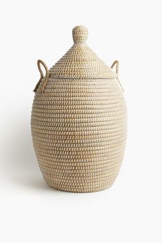 Large basket with lid in braided straw made from seagrass. Diameter 13 3/4 - 16 1/2 in. Height with lid 31 1/4 in. Large Basket With Lid, Hooded Lids, Wall Basket Storage, Extra Large Basket, Storage Basket With Lid, Lidded Basket, Large Storage Basket, Rattan Baskets, Storage Baskets With Lids