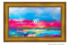 an abstract painting with a gold frame and a video player button in the center that reads watch our videos to learn more