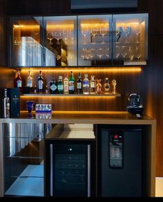 a home bar with liquor bottles on the shelves