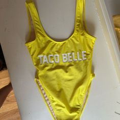 Private Party Swimsuit Taco Belle Costume Never Worn! Small/Medium Size. Perfect Halloween Costume Yellow Stretch One-piece Beachwear, Trendy Yellow One-piece Bodysuit, Yellow One Piece Swimwear For Beach, Spring Fun Fitted Bodysuit, Spring Fitted Bodysuit, Fitted Fun Bodysuit For Spring, Fun Yellow Swimwear For Pool, Yellow One-piece Beachwear For Swimming, Fun Fitted Spring Bodysuit