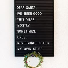 a sign that says dear santa i've been good this year mostly sometimes once never mind, ill buy my own stuff