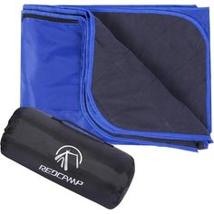 an open blue and black bag sitting next to it's zippered closures