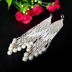 Silvery White Very Long Fringe Earrings. Sparkling, Gentle, Seed Beads Earrings. Indian Jewelry. Boho Style/ Waterfall earrings.These earrings are perfect for a wedding dress.Gradient bead earrings.Boho style Seed Beads earrings. Long Earrings. Beautiful,Sparkling, Elegant Earrings .A beautiful Christmas gift for women and girlfriend. These are long but not heavy earrings. Length of earrings 14 cm (5.50 inches). Width of earrings 0.78 inches. Materials;Czech seed beads.Czech Crystals.Japanese se Cheap White Beaded Earrings For Party, Bohemian Dangle Crystal Earrings For Party, Bohemian Pearl Jewelry For Party, Dangling Beads Bridal Earrings For Celebration, Bohemian Party Jewelry With Dangling Beads, Bridal Dangle Earrings With Dangling Beads, Bridal Earrings With Dangling Beads For Celebration, Party Pearl Beaded Bridal Earrings, Pearl Beaded Earrings For Party