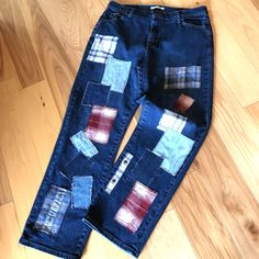 Plaid flannel patchwork jeans, women's size 16 medium, upcycled reworked distressed jeans with denim and plaid flannel patches in navy and burgundy.  These jeans would make a great fall or winter outfit for anyone who likes fun, unique clothing.   (WANT TO SEE MORE FROM THIS COLLECTION? Type PLPJ in this store's search field.) DETAILS: Size:  Women's size 16 medium Brand:  Lee Materials:  99% cotton, 1% spandex MEASUREMENTS: Waist:  33 inches Hips:  45 inches Inseam:  31 inches Front Rise:  12-1/2 inches Back Rise:  16 inches Circumference bottom of leg:  18 inches Be sure to check the size and measurements.  Sizing for clothing brands is often different! Hint:  To be sure this item will fit, lay your favorite pants/jeans out flat and take measurements of the same areas listed above. These 1980s Fashion Outfits, Band Aesthetic Concert, Rock And Roll Outfits, Patchwork Jeans Outfit, Rock Band Aesthetic, Women Size 16, Aesthetic Concert, Refashioned Clothing, Funky Pants