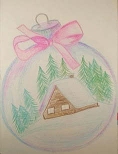 a drawing of a christmas ornament with a house in the snow and a pink bow