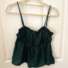 Deep Emerald Green Camisole Top With Adjustable Spaghetti Straps. Size Small, Never Worn. Bow Detail On Front. Forest Green Tops, Green Casual Crop Top With Adjustable Straps, Casual Green Crop Top With Adjustable Straps, Summer Crop Top With Spaghetti Straps, Summer Spaghetti Strap Crop Top Vest, Spring Green Camisole With Straps, Green Cotton Tank Top With Built-in Bra, Casual Green Tops With Straps, Green Strappy Camisole For Summer