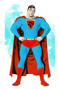 a man dressed as superman standing with his hands on his hips