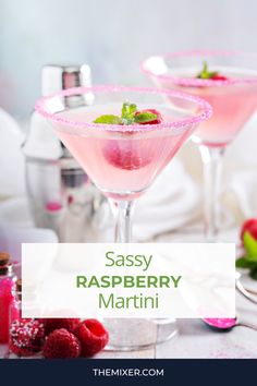 raspberry martini with mint garnish on the rim and text overlay says sassy raspberry martini