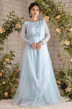 Ice blue floor length tulle gown with  beads , sequin and pearl hand embroidery. This beautiful gown is perfect for wedding, aniversary and formal functions  ✨This dress can be customise in any other colour and in all size, please contact us regarding any changes if you want.We will make this dress as per your choice. ✨We use high quality fabric and threads for embroidery.You won't face any problem in future regarding fading of colour or anything. You can use this outfit for many years.  ✨There may be slight colour difference due to high quality camera resolution and other filters. Rest every thing will be same.  🌸Care Instructions Dry clean only Floor-length Ball Gown With Intricate Embroidery For Wedding, Princess Ball Gown For Wedding And Prom Season, Princess Style Floor-length Wedding Gown, Floor-length Ball Gown With Intricate Embroidery For Reception, Princess Style Floor-length Wedding Dress For Prom Season, Princess Style Wedding Gown Floor-length, Sequined Ball Gown For Receptions, Sequin Ball Gown For Reception, Blue Tulle Gown With Sequins