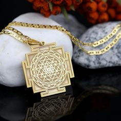 Welcome to Miss Karma Jewelry Sri Yantra jeweled necklace on 925 silver and 14k solid real gold. -DETAİLS - You can write on the back of the necklace. - The model length in the photo is 24 mm. - 14 carat solid gold or 925 sterling silver - The necklace/pendant can also be purchased without a chain. - You can choose the material you want and the production will be done accordingly. -The thickness of silver and plated pendants is 1,2 mm. -The thickness of the gold necklace is 0,8 mm. -DESCRIPTION - Material High Quality 925 Sterling Silver, 14 Karat Gold - Plating Gold, Silver, Rhodium plating, Gold plating, Gold gilding - This product is handcrafted in our workshop. A beautiful gift for yourself, your family and friends. - Visit our store for all our jewellery. -HOWTOORDER - Simply select t Temple Jewelry Round Pendant Gift, Hallmarked Brass Pendant Jewelry, Engraved Temple Jewelry As A Gift, Traditional Pendant Necklace Tarnish Resistant, Temple Jewelry Pendant As Gift, Gold Brass Locket Necklace, Round Pendant Jewelry For Festivals And Gifts, Temple Jewelry Pendant Gift, Gold Locket Necklace In Brass