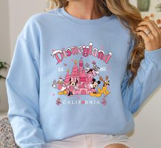 ABOUT OUR PRODUCTS: --------------------------------- Christmas Disneyland Sweatshirt|Pink Disneyland Sweater|Mickey & Friends Crewneck|Candy Canes, Goofy, Mickey and Minnie Shirt|Christmas Gift Textiled from original Gildan 18000 sweatshirt fabric, our sweatshirts offer the highest quality combination of comfort and durability. ABOUT BOTONOZ BOUTIQUE: ----------------------------------------- ✔ Are you looking for a special, casual and a long life sweatshirt with no fading of colors? Then you h Disneyland Sweater, Pink Disneyland, Christmas Disneyland, Disneyland Sweatshirt, Minnie Shirt, Sweatshirt Fabric, Nov 6, Mickey And Minnie, Candy Canes