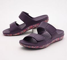 Playfully printed with an eye-catching pattern, these slide sandals are ready for all your summertime adventures. From Alegria. Comfortable Purple Sandals For Summer, Purple Non-slip Sandals For Vacation, Purple Non-slip Sandals For Summer, Non-slip Purple Sandals For Vacation, Non-slip Purple Sandals For Summer, Purple Non-slip Slide Sandals, Casual Purple Sandals For Vacation, Purple Cushioned Beach Sandals, Casual Purple Flip Flops For Summer