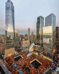 an aerial view of skyscrapers in the city