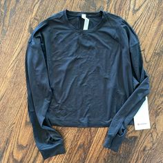 Brand New Black Lululemon Top, Size 6 Lululemon Long Sleeve Shirts, Lululemon Long Sleeve, Black Lululemon, Lululemon Tops, New Black, Long Sleeve Top, Lululemon Athletica, Long Sleeve Tops, Long Sleeve Tees