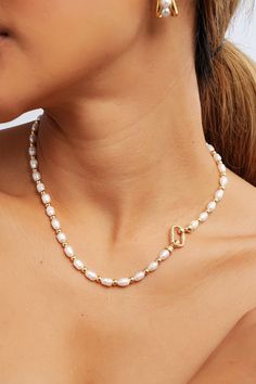 Picture yourself adorned in the delicate pearls of this beaded pearl necklace, exuding effortless charm and sophistication. Ideal for any occasion, from brunch with friends to a romantic evening out, these pearls add a touch of timeless beauty to your ensemble. Elegant Pearl White Beaded Chain Necklace, Elegant Pearl White Necklace With Beaded Chain, Elegant Beaded Chain Pearl Necklace For Wedding, Elegant Pearl Necklace With Beaded Chain For Wedding, Feminine Pearl Charm Jewelry With Round Beads, Elegant Wedding Pearl Necklace With Beaded Chain, Chic Pearl Beaded Necklaces For Party, Elegant Pearl Beaded Necklace With Pearl Chain, Elegant Pearl Beaded Necklaces With Pearl Chain