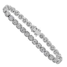 An illusion link bracelet, showcasing a cluster of round cut diamonds weighing 5.13 carats total, set in a cushion shape mounting made of 18K white gold. Diamonds are set in a way that makes it look like each link contains one big diamond. Perfect for casual or formal wear.  Roman Malakov is a custom house, specializing in creating anything you can imagine. If you would like to receive a special quote on a custom piece, please message or call us. Luxury Diamond Bracelet With Halo Setting, Luxury Tennis Bracelet With Halo Setting For Formal Events, Luxury Tennis Bracelet With Halo Setting For Formal Occasions, Luxury Diamond Bracelet With Halo Setting For Formal Events, Luxury Diamond Bracelet With Halo Setting For Formal Occasions, Luxury Diamond Bracelets With Halo Setting, Luxury Formal Bracelet With Halo Setting, Diamond Bracelets With Halo Setting For Wedding, Luxury Formal Bracelets With Halo Setting