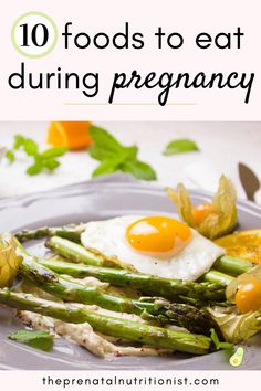 asparagus and eggs on a plate with text overlay reading 10 foods to eat during pregnancy