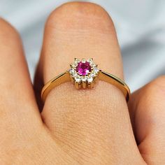 14K Solid Gold Birth Flower Ruby Ring 🌹 Celebrate Birthdays with the 14K Solid Gold Birth Flower Ruby Ring 🌹 🌟 Product Features: ⚖️ Weight: 1.45 Grams 🌈 Material Colors: Available in Yellow Gold, Rose Gold, and White Gold 🎁 Presentation: Shipped with a special box and bag, perfect for gifting 🔄 Returns: Right to return within 7 days ✨ Material and Color: Designed to never fade or darken 🛠️ Handcraftsmanship and Uniqueness: Handcrafted with love, may vary by 5% (+-) The 14K Solid Gold Birt Fine Jewelry Flower-shaped Birthstone Promise Ring, Adjustable Gold Flower Ring With Birth Flower, Gold Flower-shaped May Birthstone Jewelry, Fine Jewelry Flower-shaped Ruby Ring Gift, Valentine's Day Gift: 14k Gold Ruby Ring, Godfather Gifts, Big Sister Gifts, Handmade Gold Jewellery, Godmother Gifts