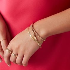 Elegant with a touch of whimsy, our Bubble Bracelets are the quintessential MB style. Each 7-inch bracelet features shiny 4mm hollow 14k yellow gold beads that connect with a lobster clasp. Wear it alone, or mix and match with other bracelets for a one-of-a-kind arm party. In stock bracelets will ship within 3 business days Made to order bracelets ship within 1 week. Need it sooner? Contact us. Details 4mm hollow 14k beads Approximately 7" Lobster Clasp Shipping + Returns In stock bracelets sets Everyday Single Strand Bracelets, Elegant Everyday Gold Bracelet With Round Beads, 14k Gold Bracelets For Everyday Elegance, Gold Single Strand Beaded Bracelets, Elegant Stackable 14k Gold Beaded Bracelets, Elegant Everyday Beaded Jubilee Bracelet, Elegant Flexible Bracelets With Round Beads, Modern Stackable Jewelry With Round Beads, Modern Yellow Gold Bracelets With Round Beads