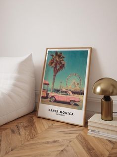 a pink car parked in front of a ferris wheel and palm tree on the floor