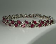 Natural Ruby Jewelry Ruby Diamond Bracelet Ruby Bracelet Ruby | Etsy Elegant Marquise Ruby Jewelry, Elegant Diamond Bracelet With Jewels, Formal Red Diamond Bracelet, Fine Jewelry Bracelets With Jewels For Anniversary, Red Fine Jewelry Tennis Bracelet For Wedding, Anniversary Fine Jewelry Bracelets With Jewels, Red Tennis Bracelet For Wedding, Red Diamond Oval Bracelet, Marquise Ruby Jewelry With 17 Jewels