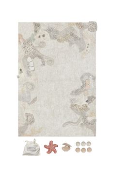 an animal themed rug with buttons and other items